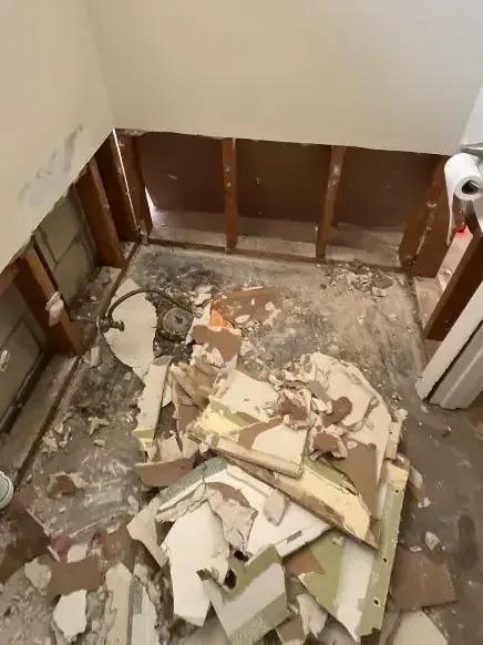 Bathroom stripped to the studs during a sewage backup cleanup