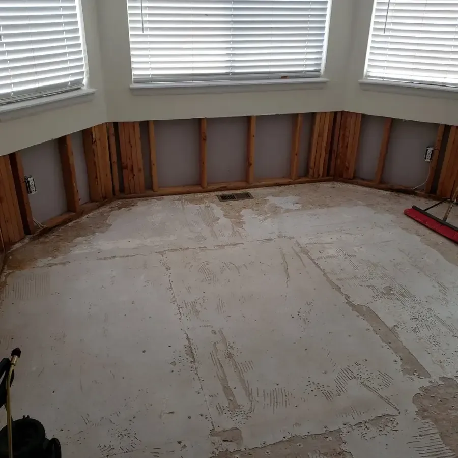 Room with the flooring and lower drywall removed after contaminated water